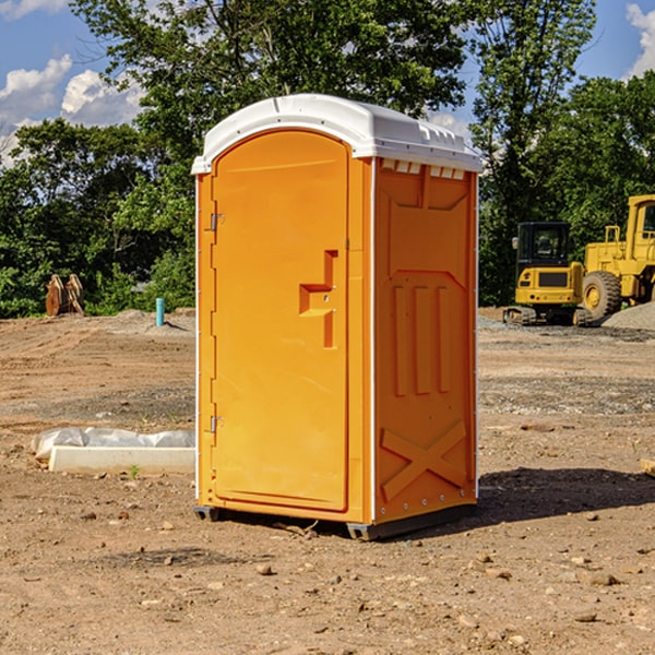 what is the cost difference between standard and deluxe porta potty rentals in Brookford